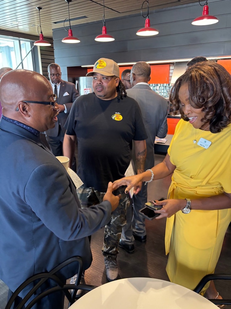 Vicki Cox connecting with community leaders at an event